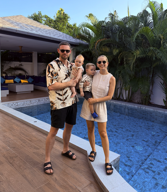 James Hacking with his wife and two young sons on holiday